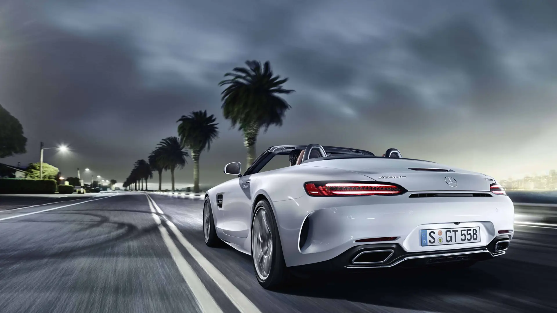 Mercedes-AMG Roadster Driving on Night Highway