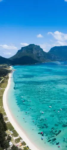 1080x2400 Mobile Wallpaper - 航拍白沙滩海湾 澄澈碧海停泊游船 远处青山环抱